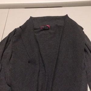 Woman’s long-sleeved open sweater